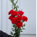 Букет із 8 червоних гвоздик 1 доставка квітів ракурс