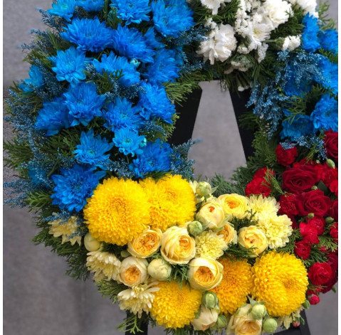 Круглий вінок Дружба країн 3 доставка квітів
