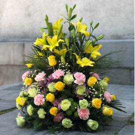 Composition for a funeral ceremony with lilies Flower delivery
